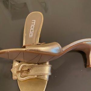 Gold pumps new with mild scratch